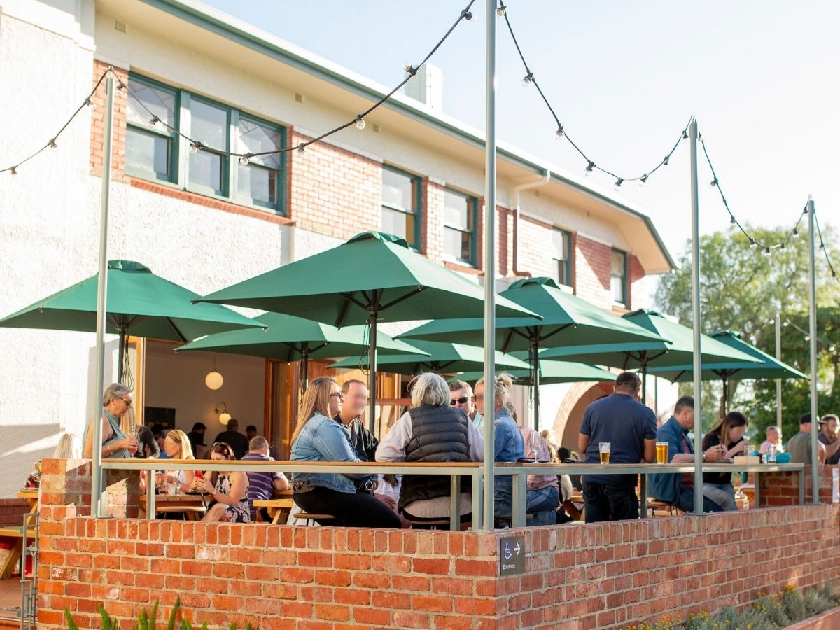 Sunranger Cafe Series Umbrellas In An Outdoor Restaurant